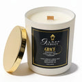Grace Street 'Grace' scented candle in a white glass jar with a black and gold label, shown with its gold lid leaning against the jar on a white background.